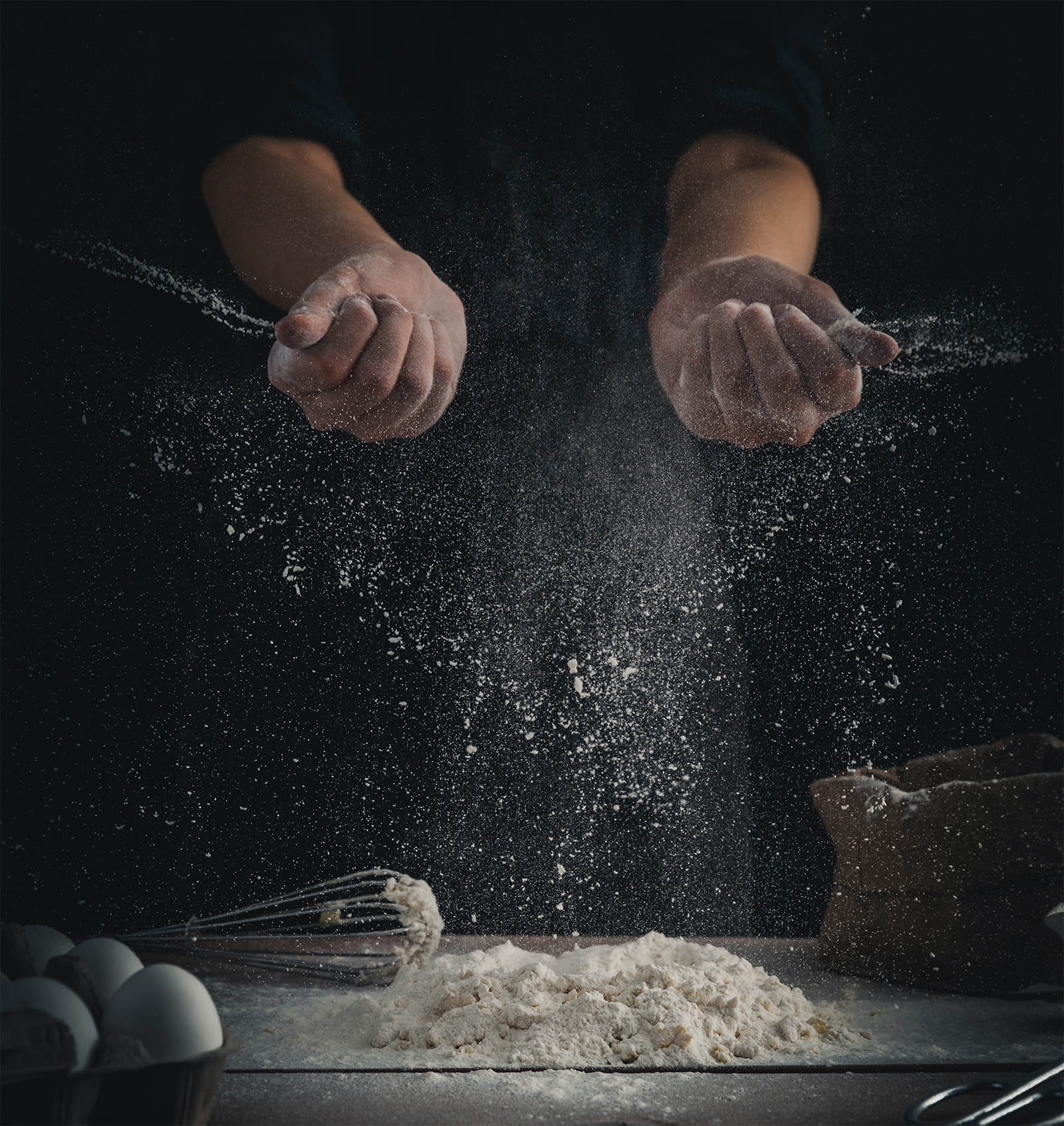 Ma manipulating flour for a recipe