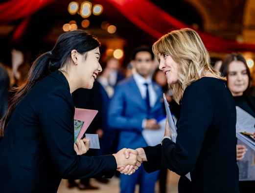 Student networking at a job fair